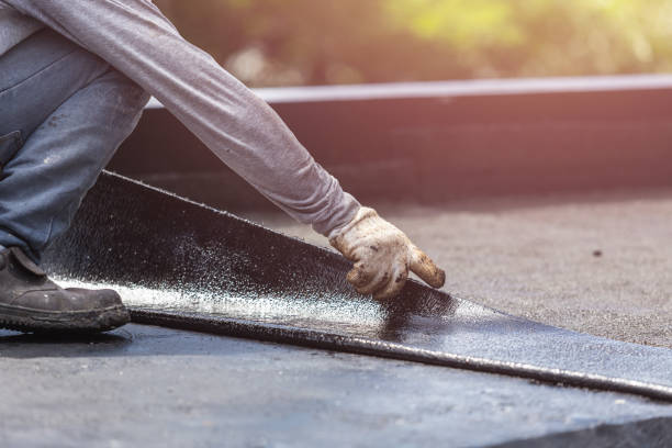 Professional Emergency Waterproofing technician working in Helmsburg, IN